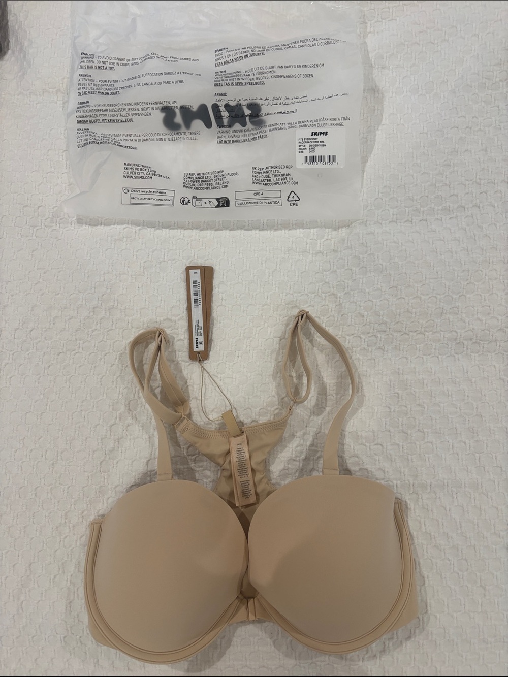 Skims fits everybody racer back Demi bra in sand